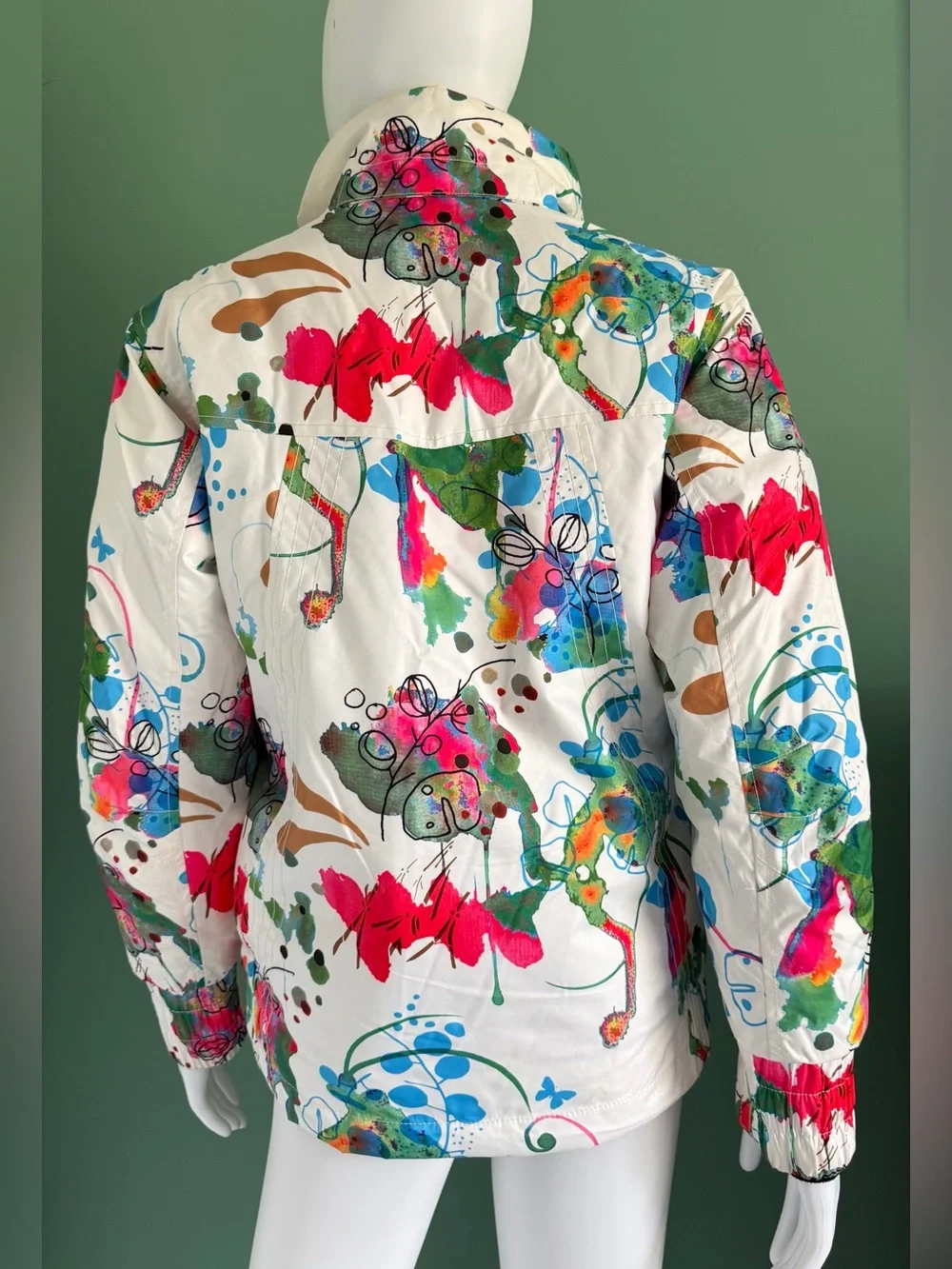Spyder Women's White Ski Jacket with Multicolor Abstract Art Print